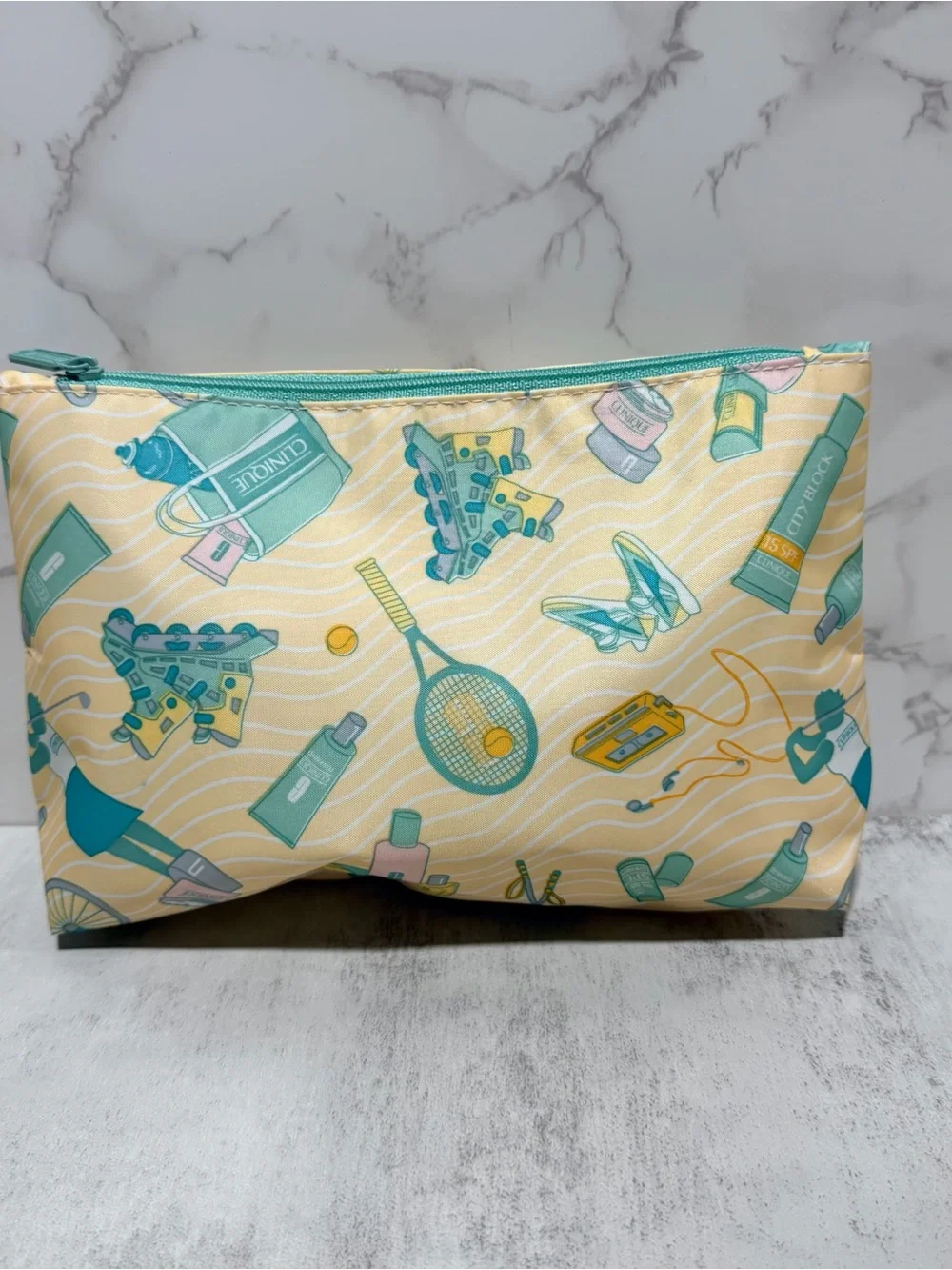 CLINIQUE Yellow & Teal Tennis Graphic Cosmetic Pouch